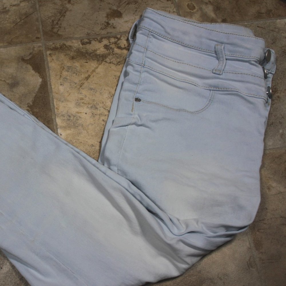 3 Button Mid-Rise Skinny Jeans